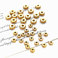 Perles d'espacement plates et rondes en acier inoxydable plaqué or 18 carats PVD pour la fabrication de bijoux - Vente en gros