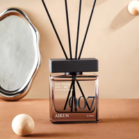 Diffuseur de parfum d'ambiance Aikun 100ml en verre créatif floral pour salon et toilettes, avec bâtonnets en rotin pour une fraîcheur longue durée