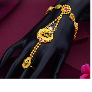 Traditional gold hand harness <b>bracelet</b> with floral design and <b>gemstone</b> accents elegant bridal jewelry for festive and wedding - Product Image 1