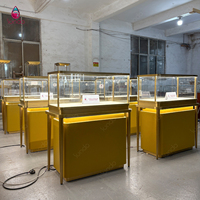 Présentoir de Bijoux en Verre Trempé à Cadre Doré Cannelé Personnalisé OEM Sundo Factory pour Vitrine de Magasin