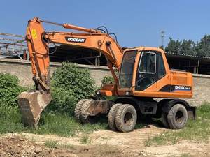 Excavadora de Ruedas Doosan DH150w de 15 Toneladas, Fabricada en Corea del Sur, Modelo 2015, Motor y Bomba Usados, 4001-6000 Horas, Capacidad de Cucharón de 0.75m - Product Image 2
