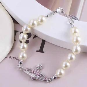 Pulsera de Perlas Rosadas de Alta Gama para Mujer, Estilo Dulce y Moderno, Diseño Exclusivo, Estilo Vivienne - Product Image 2