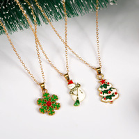 Collier tendance pour femme de bureau, thème Noël, avec pendentifs rennes, Père Noël, clochettes en alliage, cadeau