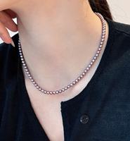 Style traditionnel chinois de la haute société, perles d'eau douce naturelles violettes, perles densement enfilées.