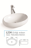 Sanitaire de forme ovale bonne qualité à bas prix comptoir en céramique lavabo évier table en porcelaine lavabo salle de bain