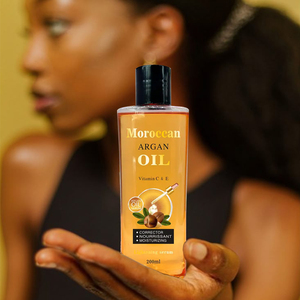 Hidratación de aceite de argán marroquí cara cuerpo <span class=keywords><strong>precio</strong></span> de fábrica protección de la piel antiarrugas brillo para la piel brillante Afroamericana - Product Image 1