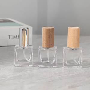 Botella de Perfume Recargable de Vidrio de Alta Calidad de 10 ml con Tapa de Madera, Mini Atomizador Portátil de Viaje para Uso Diario - Product Image 1
