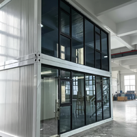 Maison conteneur préfabriquée de 20 pieds avec mur en verre et structure en acier, bureau mobile, bâtiment personnalisable en couleur et taille, design moderne