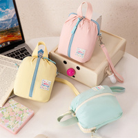 Sac de rangement portable pour serviettes hygiéniques, pochette mignonne pour les règles, mini trousse de maquillage en nylon pour filles, organiseur de serviettes hygiéniques avec poignée