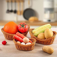 Op maat gemaakte groothandel goedkope voedselveilige handgeweven PP-wicker brood- en fruitmandje van plastic rotan voor thuisgebruik