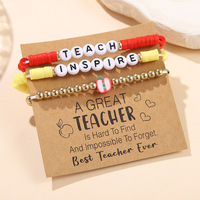 Polymer Clay armband als cadeau voor een leraar met inspirerende kaartje met tekst TEACH INSPIRE letterkraal armband