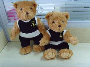 China Fabricante OEM ODM Cliente Diseño Brazos Moving Brown Plush Materials Joint Teddy Bear - Product Image 2