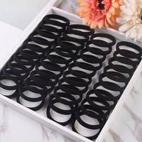 Chouchou pour cheveux d'école Boucles de cheveux noires élastiques classiques pour étudiants Supports de cheveux fiables