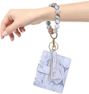 定制皮革手镯钥匙扣钱包腕带流苏硅胶钥匙扣，用于身份证信用卡零钱包女士