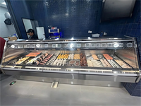 Vitrine réfrigérée commerciale en acier inoxydable avec verre incurvé pour charcuterie, viande crue et aliments cuits