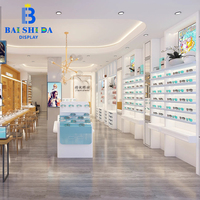 Aménagement de magasin d'optique minimaliste sur mesure, ensemble complet de présentoirs muraux blancs pour lunettes et présentoirs îlots pour vitrine d'opticien