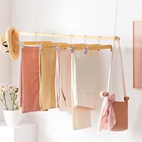En gros Percha De Pinzas Cintres à pinces pour pantalons avec pinces réglables pour jeans Cintre en bois