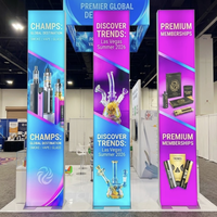 Stand d'exposition modulaire 20x20 avec éclairage arrière et enseigne suspendue pour CHAMPS Las Vegas 2027, affichages SEG rétroéclairés