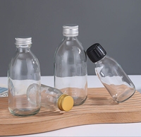 Bouteilles en verre transparent pour solution buvable liquide de 30 ml, 60 ml, 125 ml, 150 ml, 200 ml, 250 ml, 300 ml, 500 ml avec couvercle en plastique /ROPP en aluminium