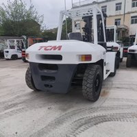 Chariot élévateur diesel 4x4 TCM FD100 d'occasion en excellent état, 10 tonnes, avec mât à 2 ou 3 étages en option, hauteur de levage de 4,5 m, pneus pleins