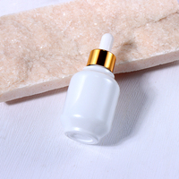 Ensemble d'emballages de luxe pour soins de la peau : flacons ronds en verre pour sérum avec compte-gouttes et pipette, logo personnalisable pour les soins du visage et des cheveux