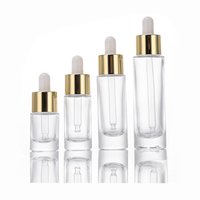 Flacon en verre transparent de 5 ml, 10 ml, 15 ml, 30 ml, design cylindrique, avec compte-gouttes doré électrolytique pour huile pour le visage, huile pour la barbe, huiles essentielles