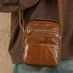 Sac bandoulière pour homme Dujiang en cuir véritable grande capacité usage quotidien marron - Product Image 1