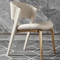 Chaise de salle à manger de restaurant moderne de luxe avec structure en acier inoxydable doré et coussin en cuir pour usage en banquet