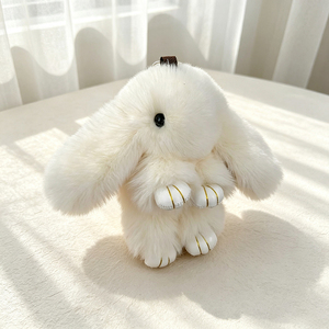 Cute White Plush Bunny <b>Keychain</b> Soft Furry Toy With Gold Trim Paws And Black Eyes For Decoration Or Gift - Product Image 1