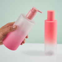 Botellas cilíndricas de PET esmerilado rosa degradado de 450 ml con tapa dispensadora para gel de baño, loción de manos, mascarilla facial y empaque de pelucas