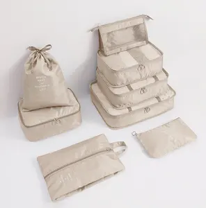 Organizadores de Equipaje al por Mayor, Juego de 8 Cubos de Embalaje para Viaje con Bolsa para Zapatos y Kits de Artículos de Aseo a Prueba de Polvo - Product Image 1
