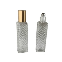 Vente en gros 12ml 14ml Bouteilles en verre à bille à cannelures moletées rectangulaires transparentes avec bouchons dorés pour huiles essentielles