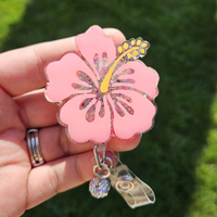 Badge rétractable personnalisé à motif fleur d'hibiscus, paillettes holographiques, gemme assortie. Fleur d'Hawaï.