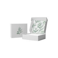 Boîte cadeau de thé blanc avec logo personnalisé, motif feuille verte et couvercle rabattable pour salons de thé et vente en gros de cadeaux
