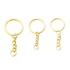 سلسلة مفاتيح معدنية مسطحة ذهبية مقاس 25-30 ملليمترًا للبيع بالجملة من المصنع مجموعة حلقات مفاتيح للبيع بالجملة للحرف اليدوية من الراتنج
