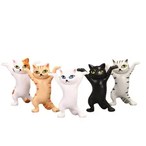 Factory price mini raised hand twisting cat toy PVC doll ornaments Dancing cat Pen Holder Toy Animal Model