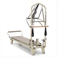 Suministro de fábrica Equipo de gimnasio Reformador de Pilates de aluminio con media torre de trapecio