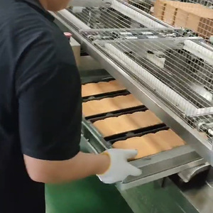 Système de démoulage de pains automatique haute capacité pour boulangeries professionnelles, idéal pour la production à grande échelle - Product Image 1