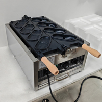 2025 Snack Machine électrique 4 pièces pantoufles électriques Machine à pain commerciale Crocs gaufrier Machine
