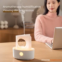Diffuseur d'arômes OEM personnalisé unique, humidificateur d'air en forme de goutte de pluie, machine d'aromathérapie en forme de lune, diffuseur d'arômes intelligent à 3 couleurs avec effet de pluie