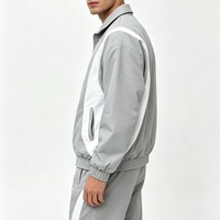 Ensemble de survêtement de luxe pour homme en nylon, coupe oversize personnalisée, coupe-vent avec col rabattable et pantalon de jogging, 2 pièces