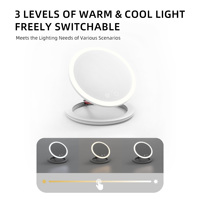 Miroir de maquillage LED intelligent rond pliable en plastique de table de chevet de voyage avec cadre portable multifonction