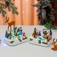 Weihnachtliche Harz-Geschenkbox-Figur mit Weihnachtsmann und Schneemann, charmante Winter-Tischdekoration für Großhandelskunden.