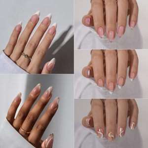 Uñas postizas de gel suave de marca privada al por mayor, cortas, almendradas, con punta francesa dorada esmaltada, de lujo, reutilizables, con pegamento. - Product Image 3