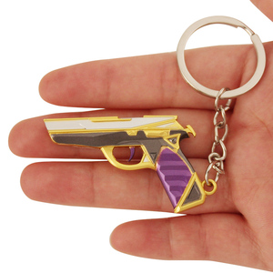 Llavero Clásico Prime de Valorant, Diseño Dorado y Morado con Grabado en Relieve, para Colección de Gamers y Pequeño Regalo Navideño - Product Image 2