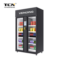 Distributeur automatique intelligent TCN AI de 1074 L pour aliments frais, collations et boissons, avec paiement par carte, fonctionnement 24h/24 et 7j/7, et fonctions visuelles.