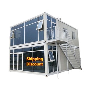 Maison conteneur modulaire à deux étages en structure acier avec escalier et balcon pour usage extérieur - Product Image 1