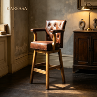 Tabouret de bar pivotant en cuir, dossier haut, capitonnage boutonné, garniture à clous en losange, accoudoirs, pieds en bois, style vintage pour bar, îlot de cuisine