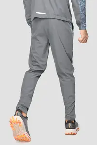 Celana panjang pelangi Ultra tipis tahan angin pria, celana panjang Joger logo reflektif latihan nilon kustom untuk pria