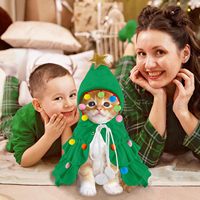 Cape pour animaux de compagnie avec chapeau avec étoile et pompons Chiot Cape Vêtements Fête Fournitures pour animaux de compagnie Accessoires pour petits chiens chats Pet Santa Present